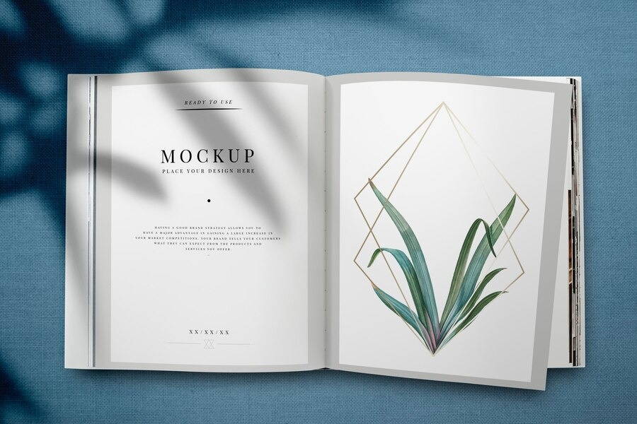 Magazine mockup with leaves and golden frame