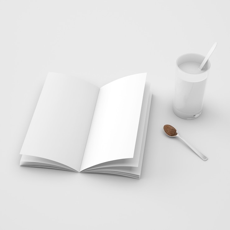 Open book and spoon with coffee